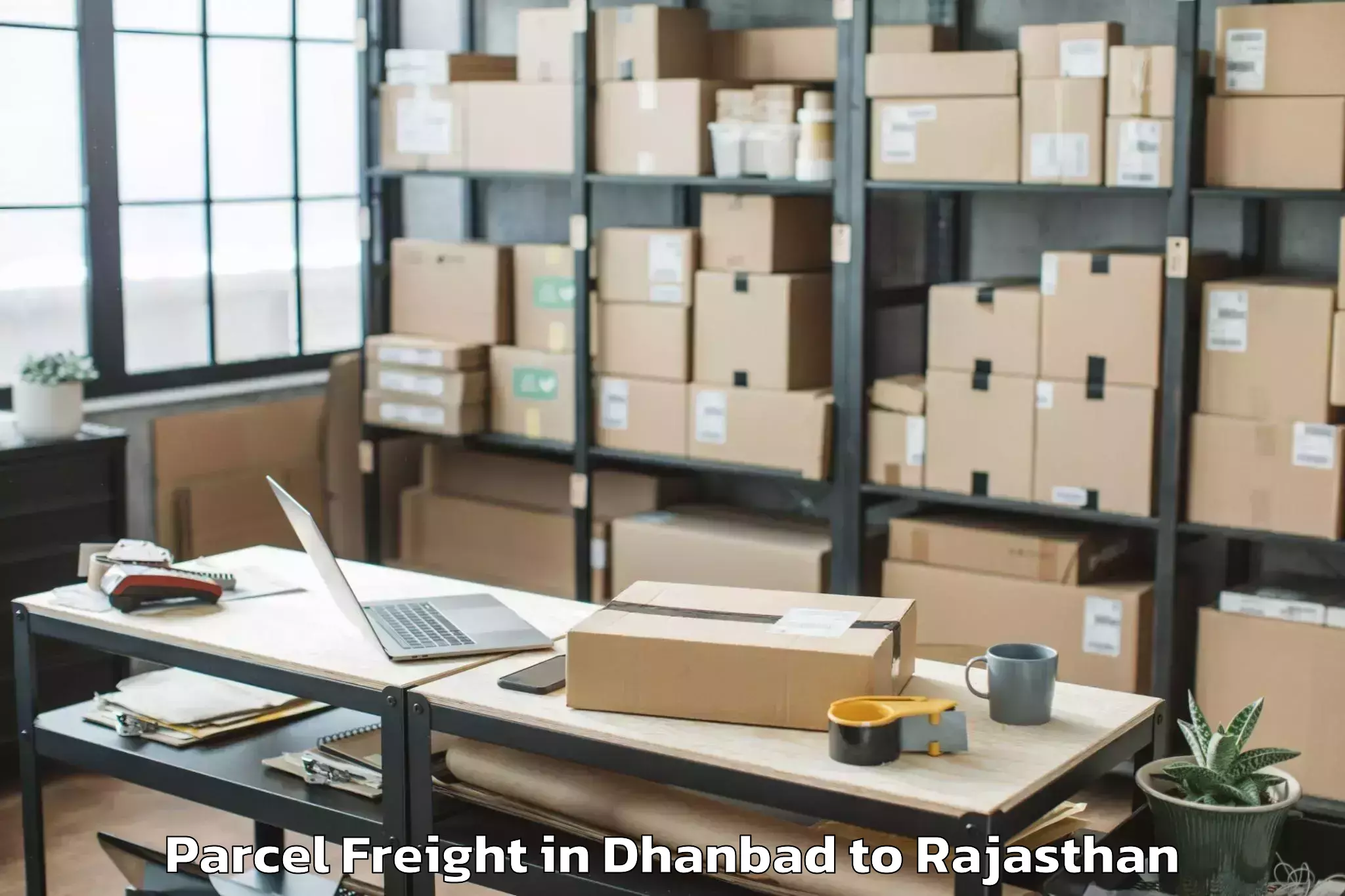 Quality Dhanbad to Niwai Parcel Freight